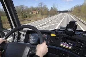 Man driving a truck on a highway in Vancouver WA