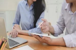 A lawyer discussing claim with his client.